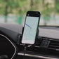 Car phone holder holding a smartphone for navigation